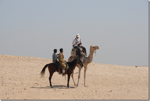 My camel guide and his assistant getting a shake down