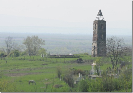 Tower of the old destroyed Cacova Church near Grădinari, Romania