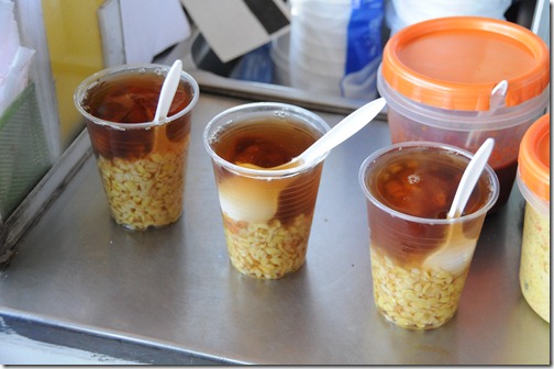 Trying out some Mote con huesillo, a husked wheat-based drink with a large dried peach inside.