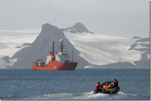 Traveling in a zodiac raft in Maxwell Bay, King George Island, Antarctica