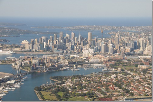 Aerial view of Sydney, Australia showing the Anzac Bridge, the C.B.D., and the Sydney Tower