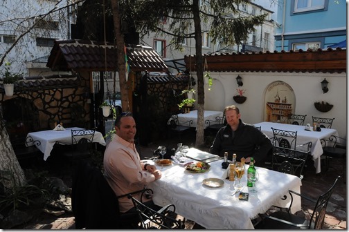 Joel and Paul dining in the patio of the Restaurant Manastirska Magernitza (Ресторант Манастирска Магерница) in Sofia, Bulgaria