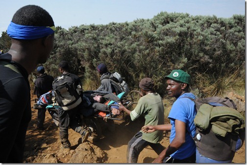 The 'Kilimanjaro Express' taking a hypoxia patient down on a stretcher on Mount Kilimanjaro