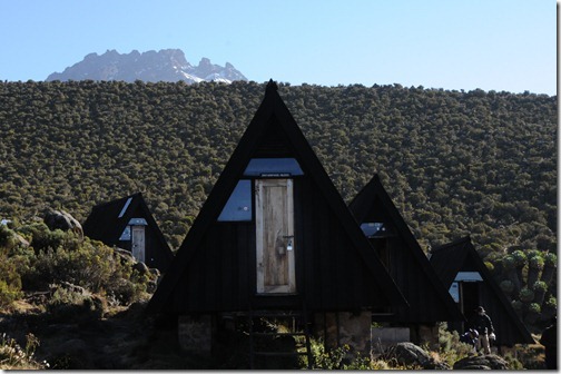 A-frame huts at Horombo Camp with Mawenzi Peak in the background - Mount Kilimanjaro, Tanzania