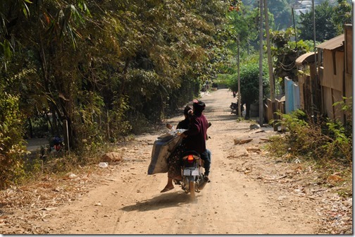 Women on a scooter in Tachileik, Burma (Myanmar)