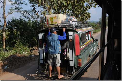 Riding on the back of a Songthaew in Chiang Rai District, Northern Thailand
