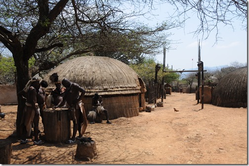 Zulu actors playing a traditional Zulu game inside Shakaland in South Africa